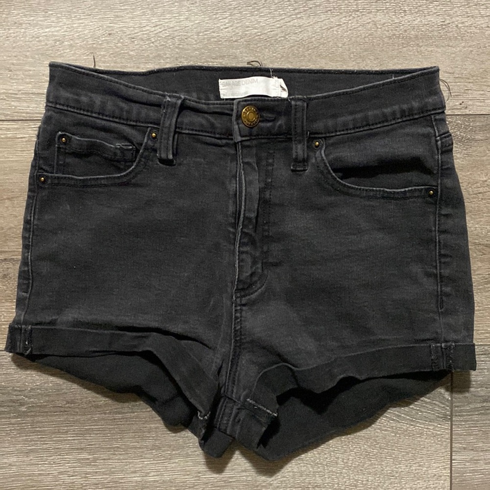 Stretchy high waisted black jean shorts with rolled cuffs